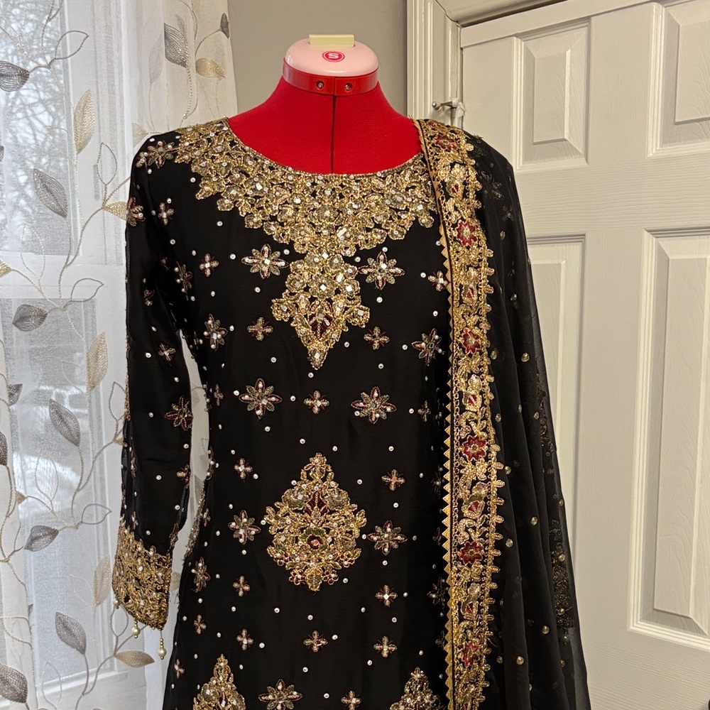 Elegant Black and Gold Embellished Dress